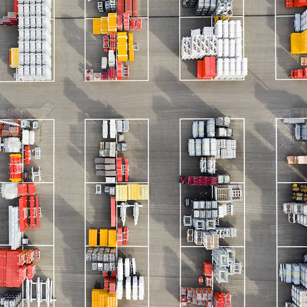 Shipping goods organized on a pier